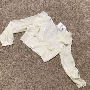 AMUR Cream Ruffled Blouse